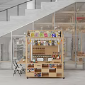Colorful Plastic Toys Display On Wooden Shelf In Children's Play Store With Glass Wall