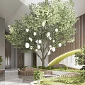 Modern Front Desk Reception Area With Large Green Tree And Wooden Counter