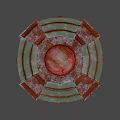 Rusted Metal Mechanical Structure With Circular Green Rings And Red Dome Top