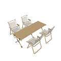 Foldable Outdoor Table With Wooden Tabletop Four Chairs And White Cushions