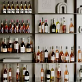 Various Wine Bottles And Glasses Neatly Arranged On Modern Multi Layer Shelves