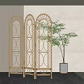 Modern Gold Frame Room Divider With Geometric Pattern And Indoor Green Plant