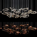 Modern Artistic Chandelier With Metallic Curves Transparent Glass And Hanging Design