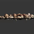 Assorted Mixed Nuts Placed On A Glass Plate With Orange Nutcracker