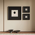 Black Framed Abstract Painting Collection with Beige Wall and Black Round Tables