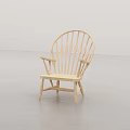 Wooden Leisure Chair With Simple Design Curved Backrest Armrests Grey Floor And White Wall