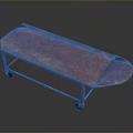 Vintage Stretcher Cart Featuring Red Weathered Surface And Metal Frame With Wheels