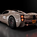 Sleek Beige Luxury Sports Car With Black Roof And Red Brake Calipers