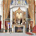 Ornate Classic Fireplace With Marble Columns Draperies Statues And Armchair In Elegant Room
