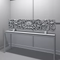 Intricate Wooden Sculpture Carving Displayed on Long Wooden Table With Bamboo Background