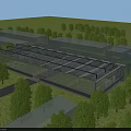 Modern Industrial Factory With Glass Roof And Wall Structures Surrounded By Green Trees