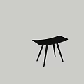 Sleek Modern Black Stool Design With Curved Seat And Three Legs