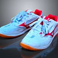 Stylish White Athletic Shoes With Red Accents Breathable Mesh And Orange Soles
