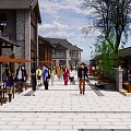 Charming Vibrant Commercial Street With Traditional Buildings Pedestrians Outdoor Seating And Trees