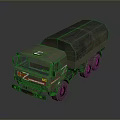 Military Green Truck With Canvas Covered Cargo Bed And Multiple Wheels