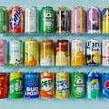 Colorful Assorted Beverage Cans With Various Flavors And Brands Displayed On Light Blue Background