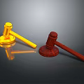 Two Shiny Golden And Red Hammers With Wooden Base As Practical Household Items