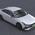 White Sporty Sedan With Sharp Front Design And Black Wheels Red Accents