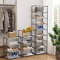 Stylish Multi Tiered Shoe Rack With Various Shoes Sunflower Bouquet And Clothes