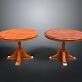 Pair of Round Wooden Dining Tables with Classic Pedestal Bases Crafted in Warm Wood Tone