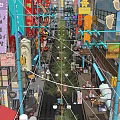 Vibrant Commercial Street With Colorful Shop Signboards Outdoor Seating And Pedestrians