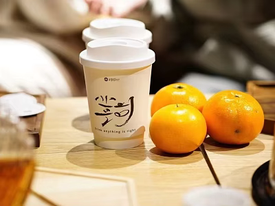 Paper Cup With White Lid Chinese Characters And Fresh Oranges On Table 3d model