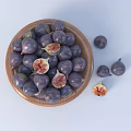 Fresh Purple Figs in Wooden Bowl with Halved Ones and Seeds on White Background
