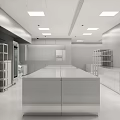 Large Commercial Kitchen With Stainless Steel Workstation Shelves Ovens Storage Cabinets And White Ceiling Lighting