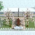 Scenic Outdoor Caravan Area With Cherry Blossom Trees Dining Table Paved Patio And Green Grass