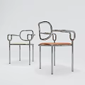 Two Modern Leisure Chairs With Chrome Frame Curved Armrests And Light Orange Leather Seats