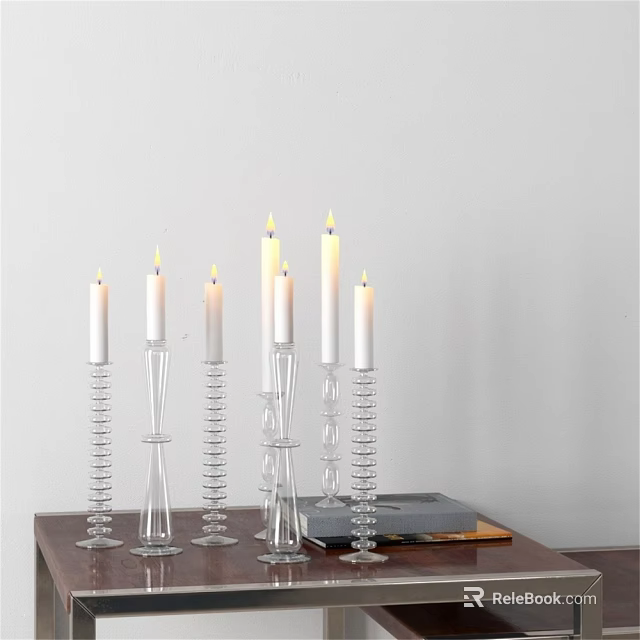 Decorative Ornament Set with Transparent Glass Candle Holders Lit White Candles on Table with Books 3d model 