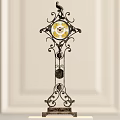 Ornate Iron Floor Clock With Golden Dial Marble Base Against Light Colored Wall Background
