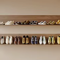 Shoes Neatly Arranged On Two Rows Of Wooden Shelves With Various Colors And Different Styles