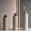 Decorative Ornament Set Featuring Three Beige Pillars and Brown Black Gold Aromatic Ornaments