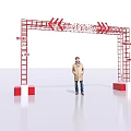 Event Entrance Arch With Red Frame Colorful Hanging Streamers Side Ladders And Person