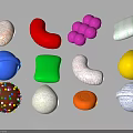 Various Colorful Shaped Soft Candy Items With Different Textures And Patterns
