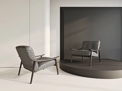 Modern Gray Fabric Armchairs With Wooden Armrests On Black Display Platform In Bright Interior 3d model