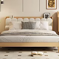 Modern Wooden Double Bed With Rounded Headboard Pillows And Blanket On Patterned Rug