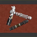 Two Unique Lightsabers With Different Hilt Designs Placed On Red Mat Surface