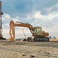 Industrial Factory Construction Site With Excavator Crane And Building Materials