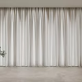 Modern Simple Curtains With Flowing Fabric In Light Colored Interior And Small Green Plant