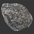 Natural Rock Surface With Crushed Stones Small Green Plants And Rough Texture