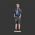 Boy Scout Standing on White Platform With Blue Shirt Neckerchief and Shorts