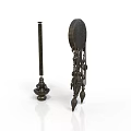 Carved Metal Sculptures With Tall Slender Column Base And Circular Decorative Pendants Intricate Patterns