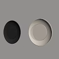 Two Black And White Wall Lamps Mounted On Light Colored Wall With Vertical Striped Decoration