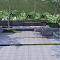 Lush Green Landscape Wall In Outdoor Space With Trees Ferns Bench And Paved Ground