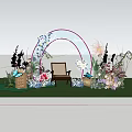 Outdoor Welcome Arch Decoration With Blue Floral Design Wooden Chair And Green Grass