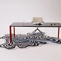 Modern Office Desk Setup With Red Legs Black Top Chair And Wavy Rug