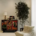 Colorful Patterned Entryway Side Cabinet With Tall Plant And Lamp Near Sofa