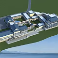 Aerial Planning of Complex With Connected Structures Blue Rooftops Green Lawns Waterfront and Mountain Views